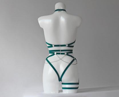 Rave harness bra with a cross pendant