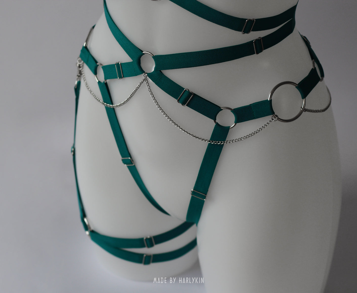 Rave harness bra with a cross pendant